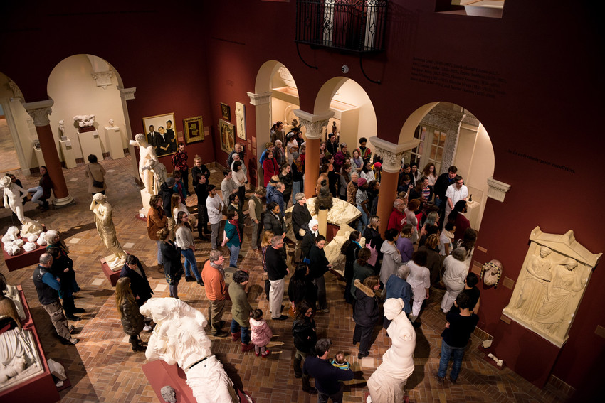 Group of people standing in the museum atrium